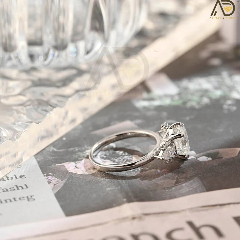 Discover our stunning Solitaire Diamond Ring with a bezel setting, featuring a captivating 14K solid gold oval cut moissanite. A perfect choice for engagement or special occasions!