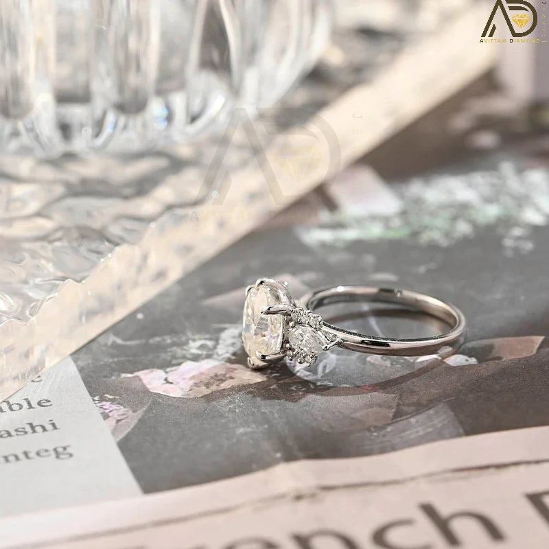 Discover our stunning Solitaire Diamond Ring with a bezel setting, featuring a captivating 14K solid gold oval cut moissanite. A perfect choice for engagement or special occasions!