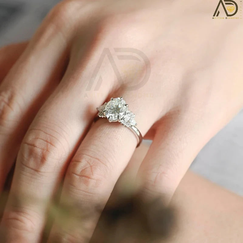 Discover our stunning Solitaire Diamond Ring with a bezel setting, featuring a captivating 14K solid gold oval cut moissanite. A perfect choice for engagement or special occasions!