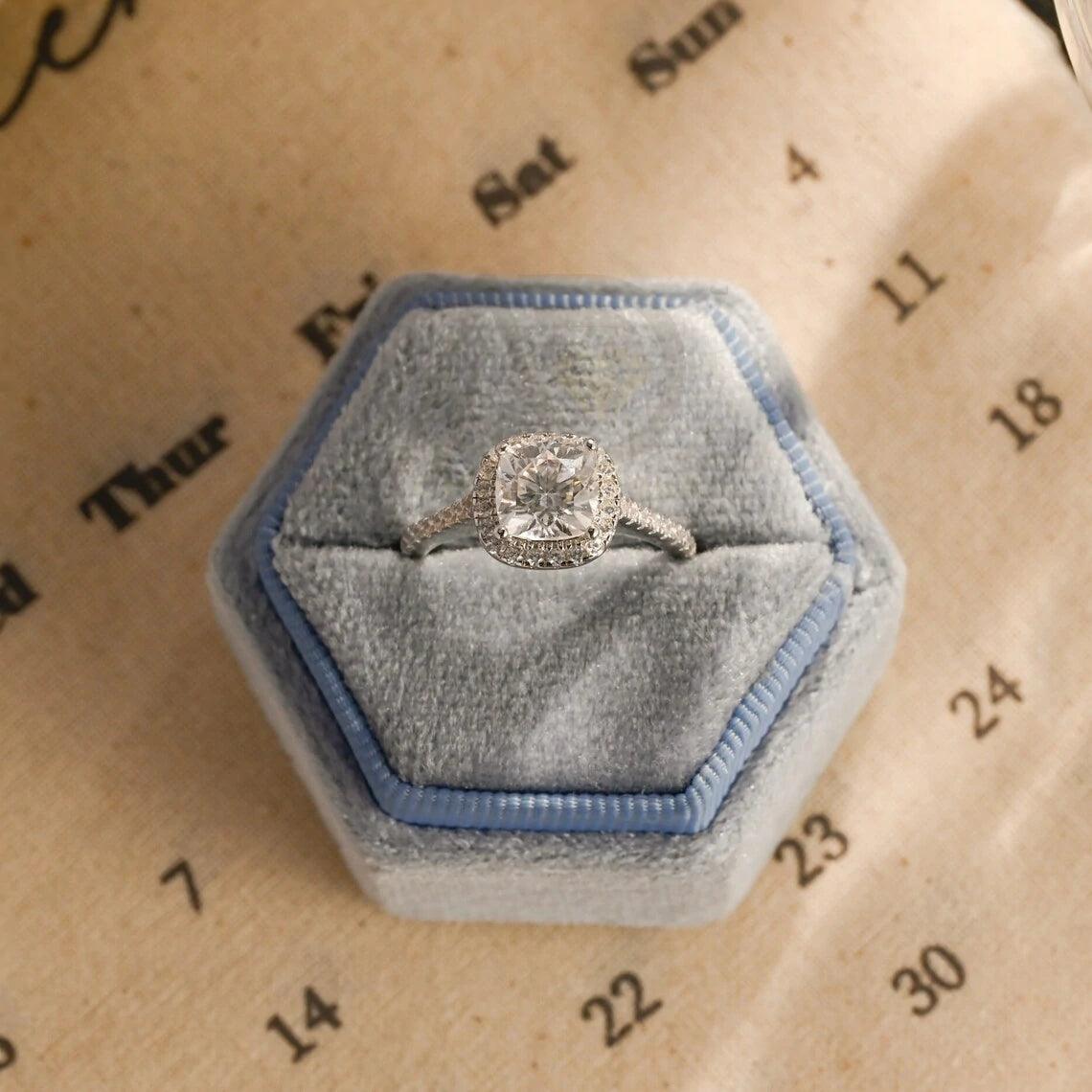 moissanite engagement, cushion diamond ring, halo diamond ring, cushion bridal ring, moissanite bridal ring, cushion wedding ring, halo wedding ring, cushion halo ring, moissanite cushion cut, elegant cushion ring, unique halo ring, vintage halo ring, classic cushion ring, custom cushion ring, gold cushion ring, platinum cushion ring, silver cushion ring, luxury cushion ring, simple cushion ring, anniversary cushion ring