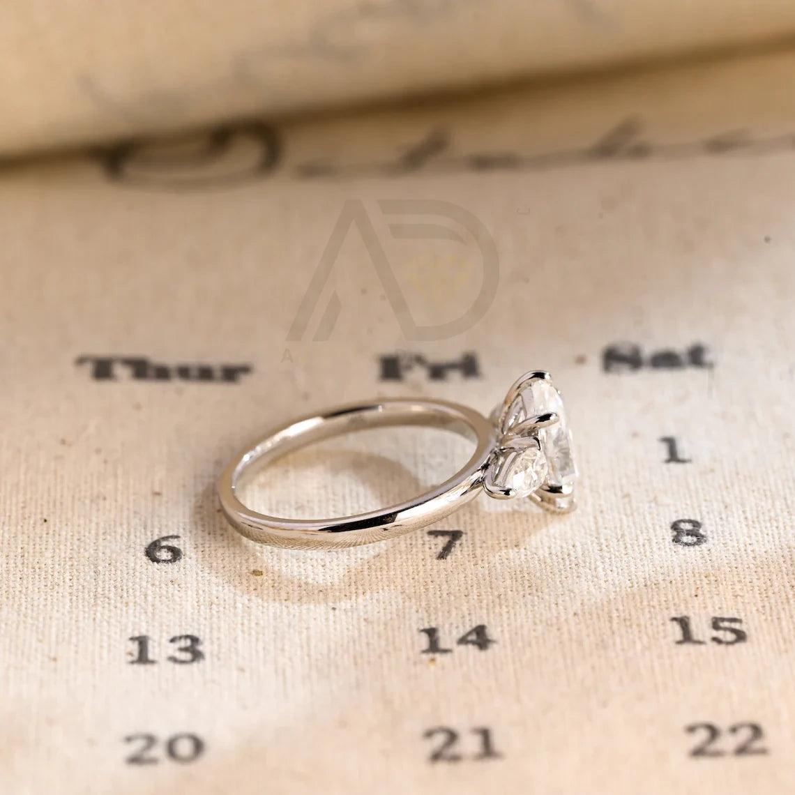 Marquise Moissanite Engagement Ring, Pear Cut Moissanite Ring, Three Stone Moissanite Ring, Handmade Moissanite Wedding Ring, Solid Gold Anniversary Ring, Women's Moissanite Ring, Customizable Wedding Band, Fine Jewelry, Unique Engagement Ring, Luxurious Anniversary Gift, Symbol of Love, Timeless Elegance, Romantic Jewelry