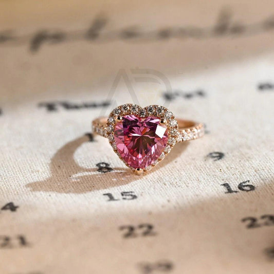 Heart cut pink moissanite engagement ring, Halo and pave ring, Solid gold heart-shaped ring, Vintage style wedding ring, Promise ring for her, Heart-shaped moissanite ring, Pink moissanite jewelry, Halo setting ring, Heart halo ring, Vintage-inspired jewelry, Solid gold promise ring, Pink gemstone ring, Wedding jewelry for her, Heart shaped engagement ring, Anniversary gift for women