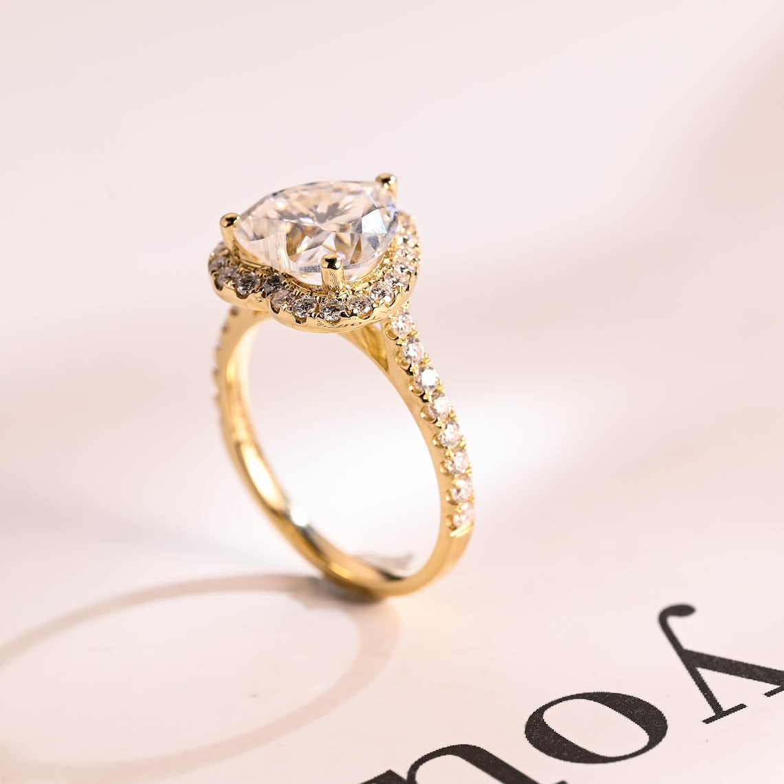 Yellow gold moissanite ring