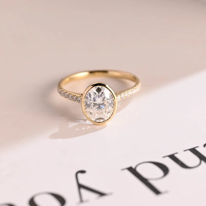 oval moissanite ring | bezel engagement ring | yellow gold bridal
