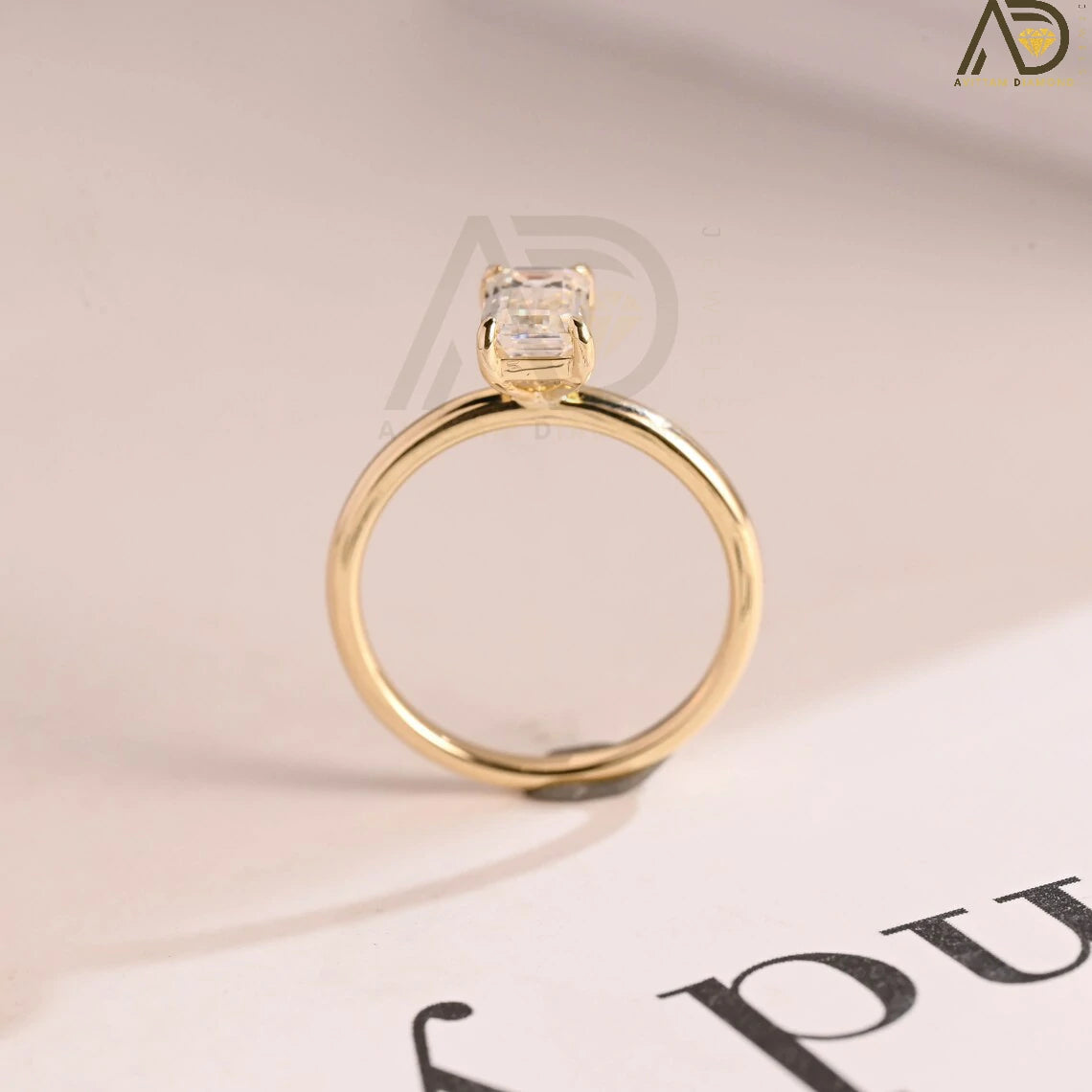 Celebrate your love with this solid gold elongated emerald cut moissanite engagement ring. The perfect choice for proposals, anniversaries, and birthday gifts. A timeless gift for her, wife, or loved one.

