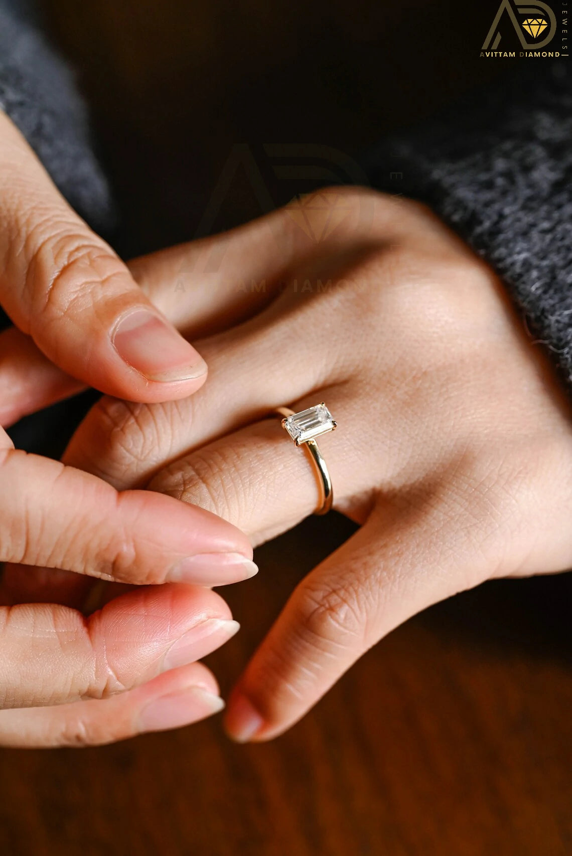 Celebrate your love with this solid gold elongated emerald cut moissanite engagement ring. The perfect choice for proposals, anniversaries, and birthday gifts. A timeless gift for her, wife, or loved one.

