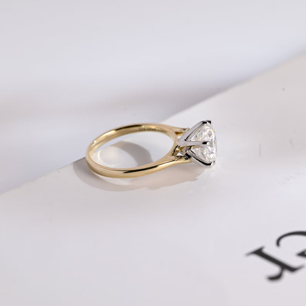 minimalist diamond proposal ring