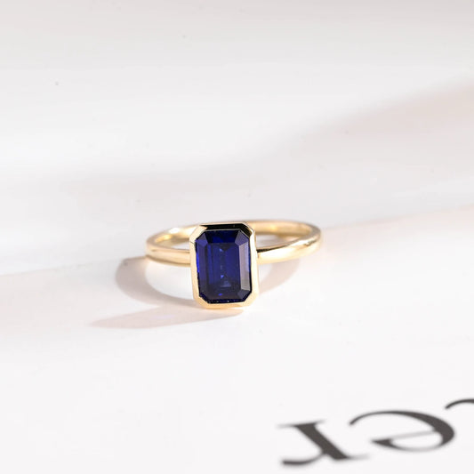 Blue emerald cut cz diamond ring