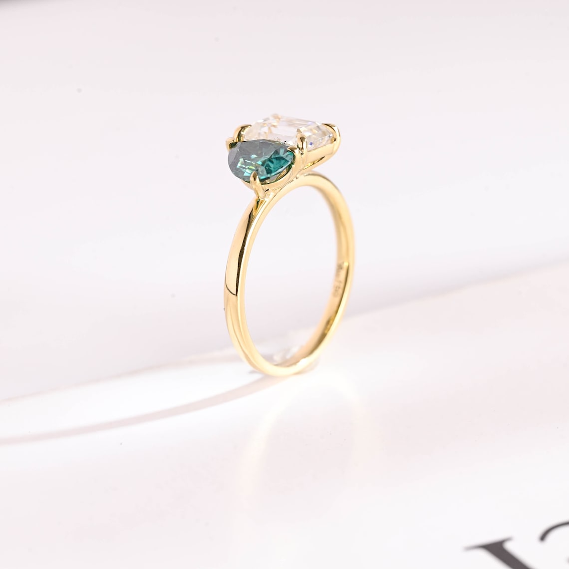 Green pear cut diamond ring