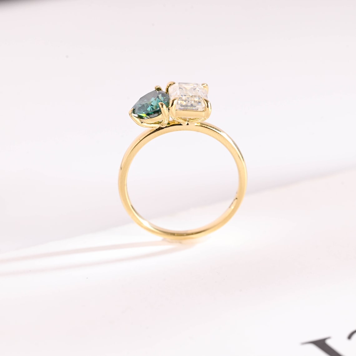 Emerald cut moissanite diamond ring