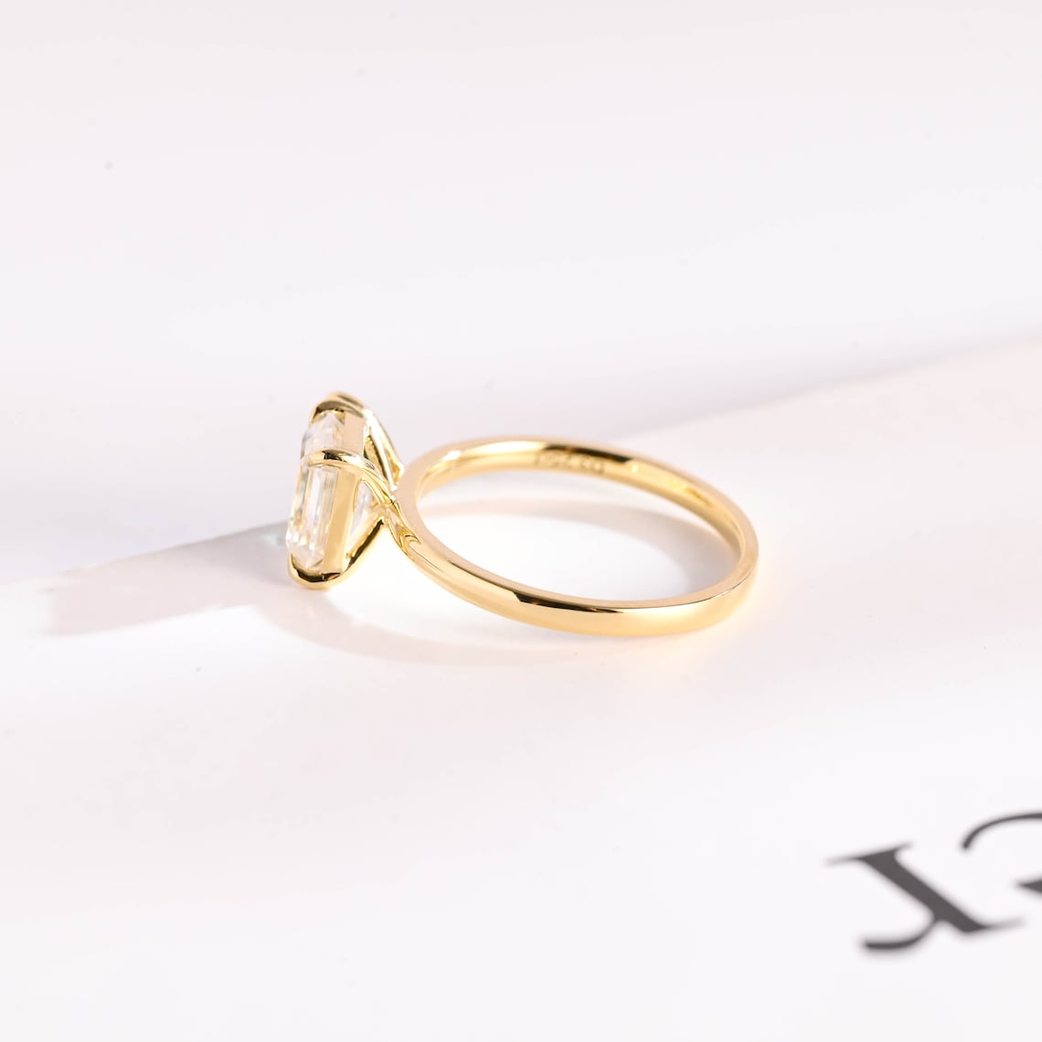 Solid gold moissanite ring