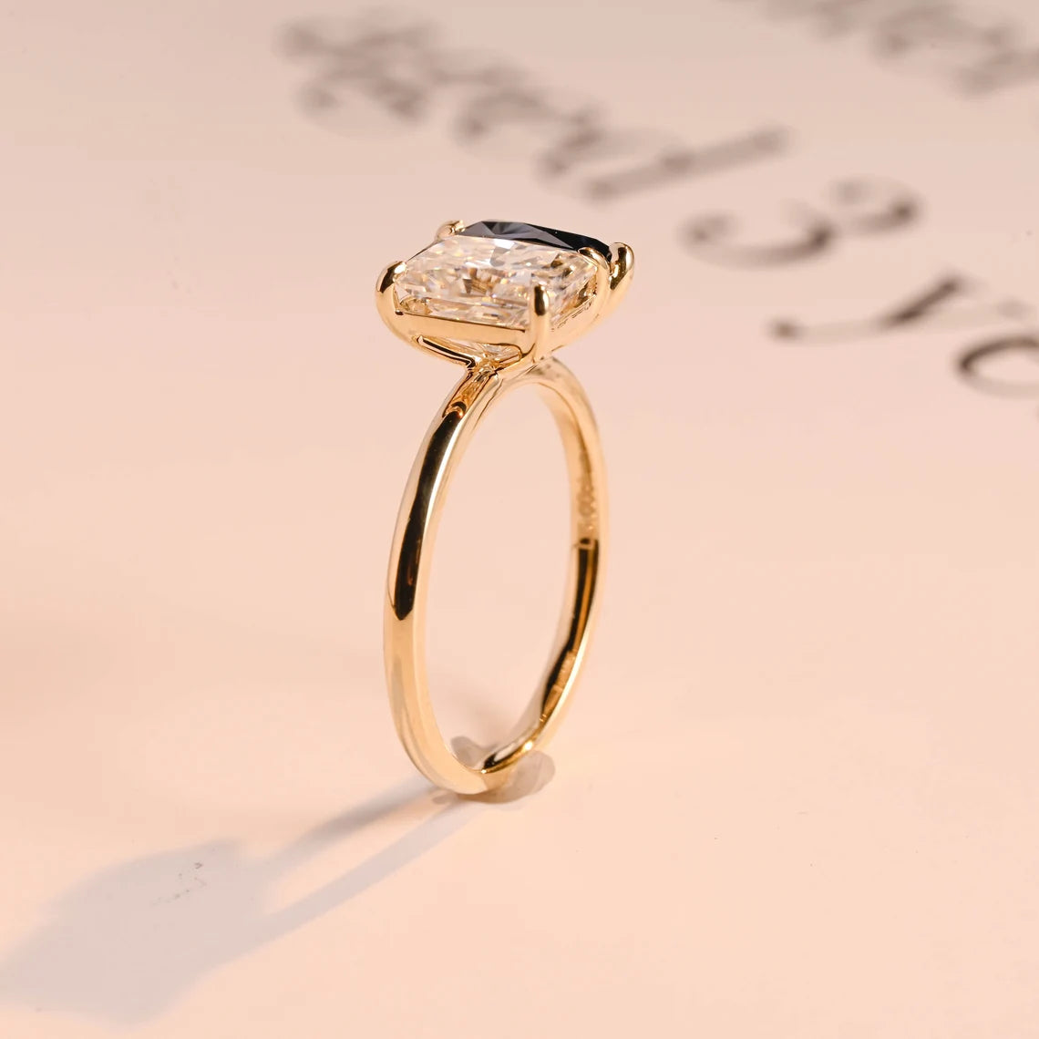 Yellow gold moissanite ring