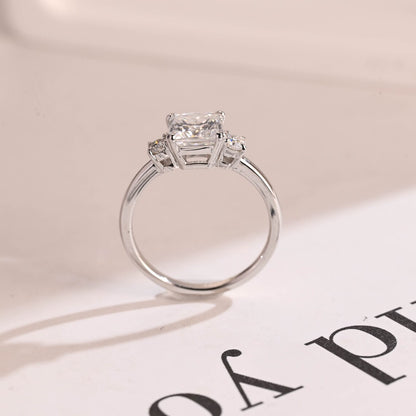Three stone engagement ring