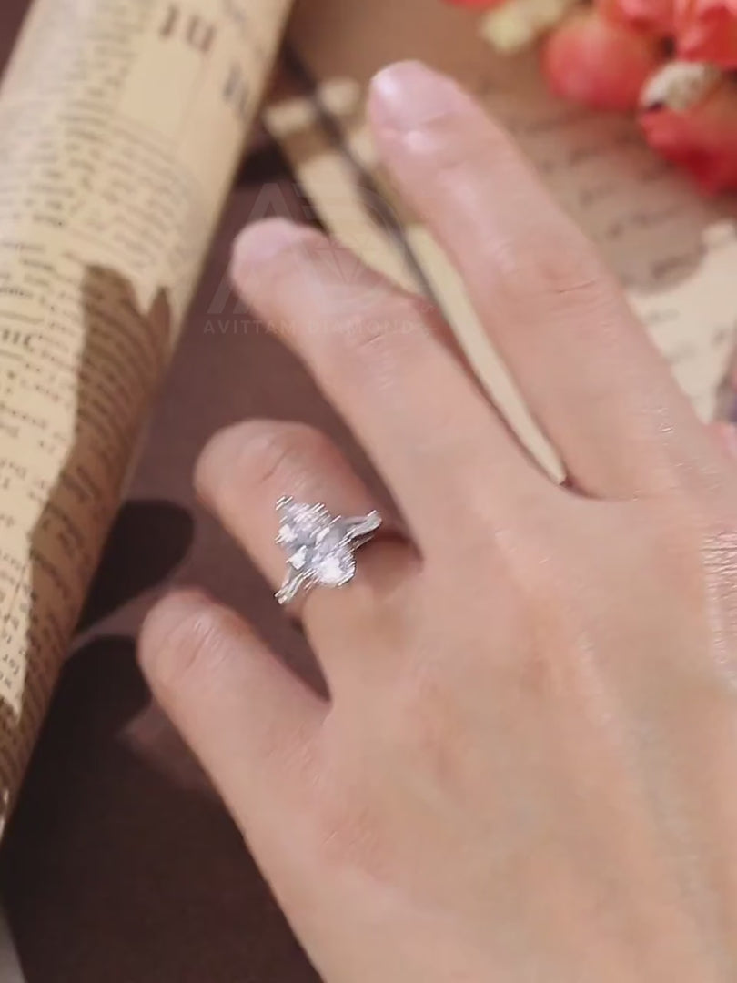 three stone marquise engagement ring with baguettes