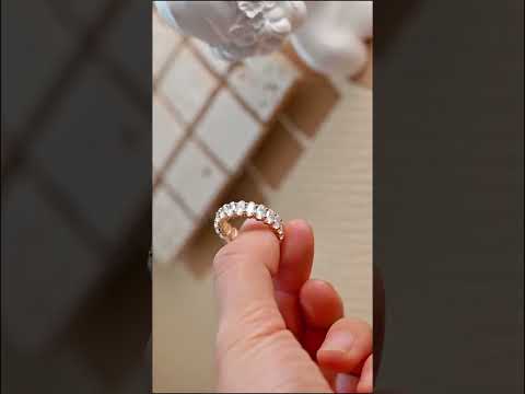 Oval-cut moissanite diamond full eternity ring with brilliant prong setting. solid gold wedding or anniversary band offering bold elegance and timeless beauty.