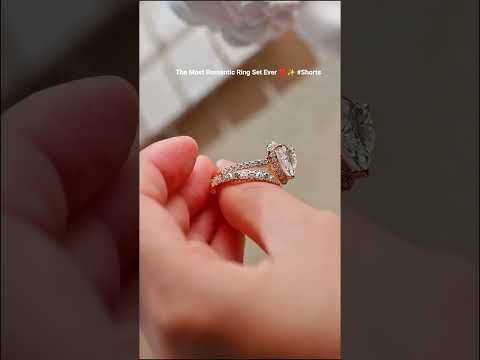 Heart cut moissanite diamond single halo engagement ring set with matching heart eternity band in solid gold. A romantic bridal ring set for proposals.