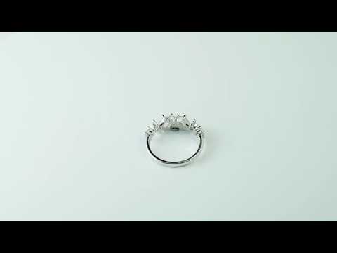 Unique mixed-shape moissanite band emerald, pear, and round stones in a brilliant multi-stone design. A perfect anniversary, bridal, or stacking ring gift.