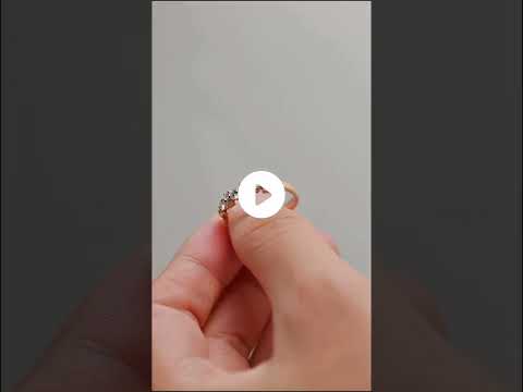 Elegant cluster round cut moissanite half eternity band ring in solid gold. A timeless wedding or anniversary ring with brilliant sparkle.