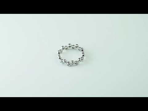 Elegant bezel round cut moissanite eternity band in solid gold. Dainty, durable and perfect for weddings, anniversaries, or stacking with any fine jewelry look.