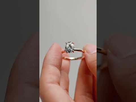 Oval cut moissanite solitaire ring with tulip prong setting and straight shank. engagement ring handcrafted for proposals, anniversaries, and special gifts.