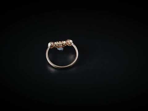 Shop a bezel set marquise and round cut moissanite diamond curved band ring with a vintage leaf design. Perfect wedding band, stackable ring, or anniversary gift.