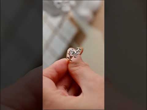 Nature-inspired marquise cut moissanite diamond engagement ring with vine and leaf bypass shank. Elegant, handcrafted, and perfect for a romantic proposal.