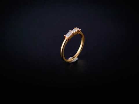 Shop a baguette and round cut moissanite diamond prong set band ring in solid gold. A minimalist wedding or anniversary band with timeless sparkle.