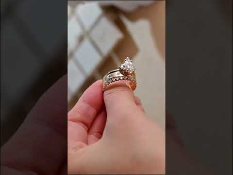 Marquise cut moissanite diamond three-piece bridal ring set with cluster accent, star engraved band and eternity ring. timeless gold engagement and wedding set.