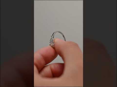 Baguette cut moissanite diamond tripod baguette side stone cluster band ring in solid gold. A minimalist wedding or anniversary ring with timeless brilliance.