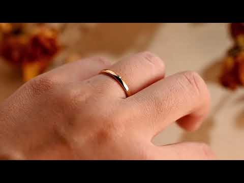 Solid gold wedding band featuring a smooth comfort-fit design. A timeless unisex ring perfect for weddings, stacking, or gifting. Minimal, classic, and refined.