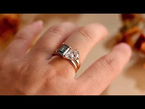 Toi et Moi moissanite bridal ring set with pear and emerald cut stones in solid gold solitaire band, a romantic two stone engagement and wedding ring set.