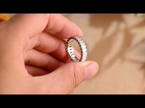 Elegant full eternity band with emerald and radiant cut moissanite diamonds. prong set design wedding or anniversary ring offering brilliant sparkle and luxury.
