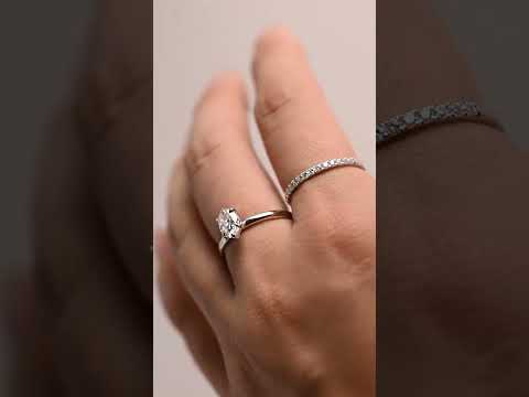 Oval Moissanite solitaire ring with prong setting and half eternity pave band. timeless, sparkling bridal set perfect for engagements, anniversaries, and gifts.
