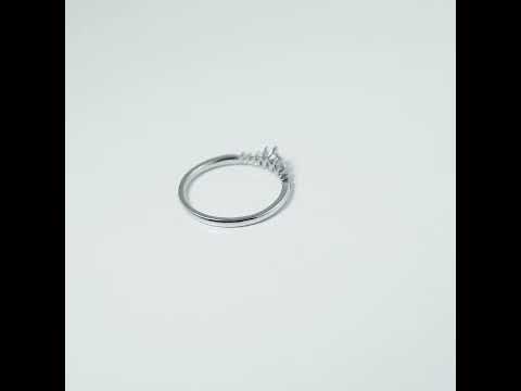 Pear-cut moissanite cluster band with prong setting. solid gold wedding or stacking ring offering brilliant sparkle and timeless elegance for everyday wear.