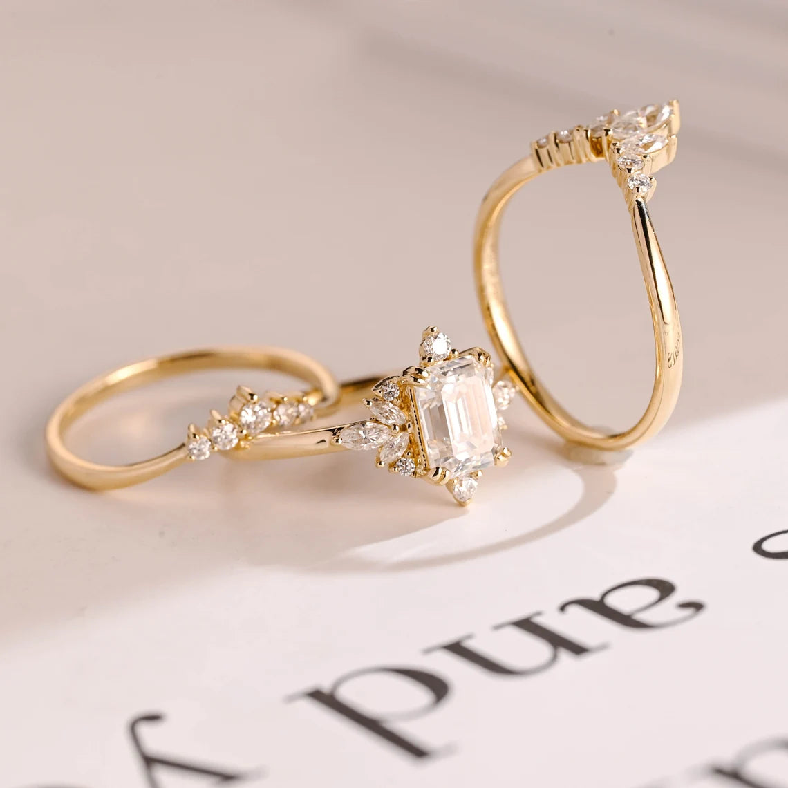 Emerald cut moissanite ring