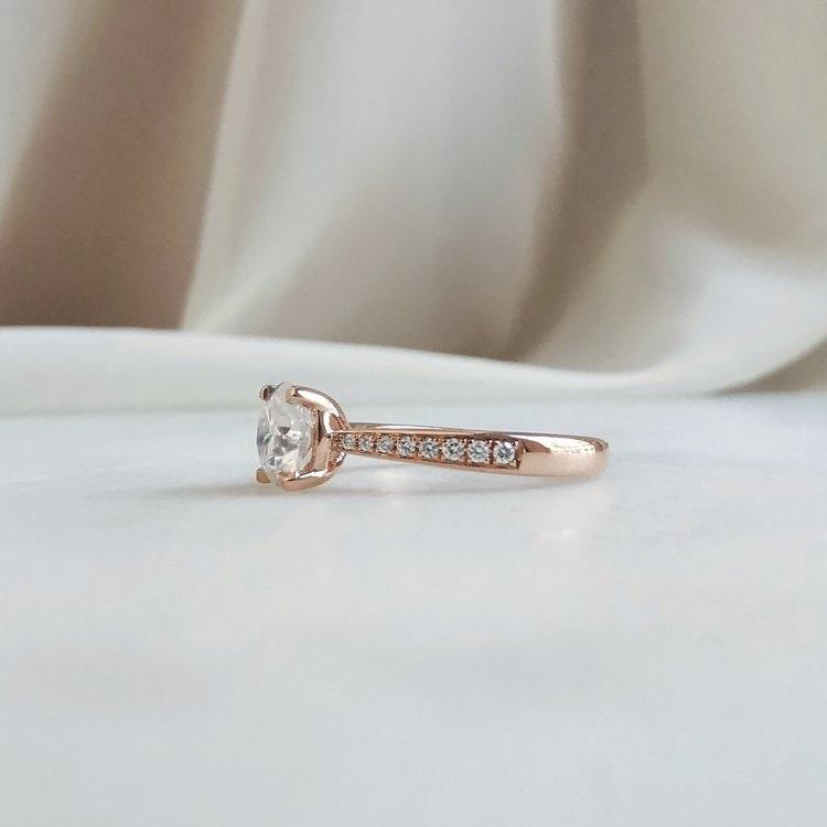 Here are additional SEO tags for your title:  Round moissanite engagement ring, Solitaire promise ring, Classic 4 prongs ring, 14K yellow gold promise ring, Personalized gift, Moissanite solitaire ring, Yellow gold engagement ring, Customizable promise ring, Romantic promise ring, Timeless engagement ring